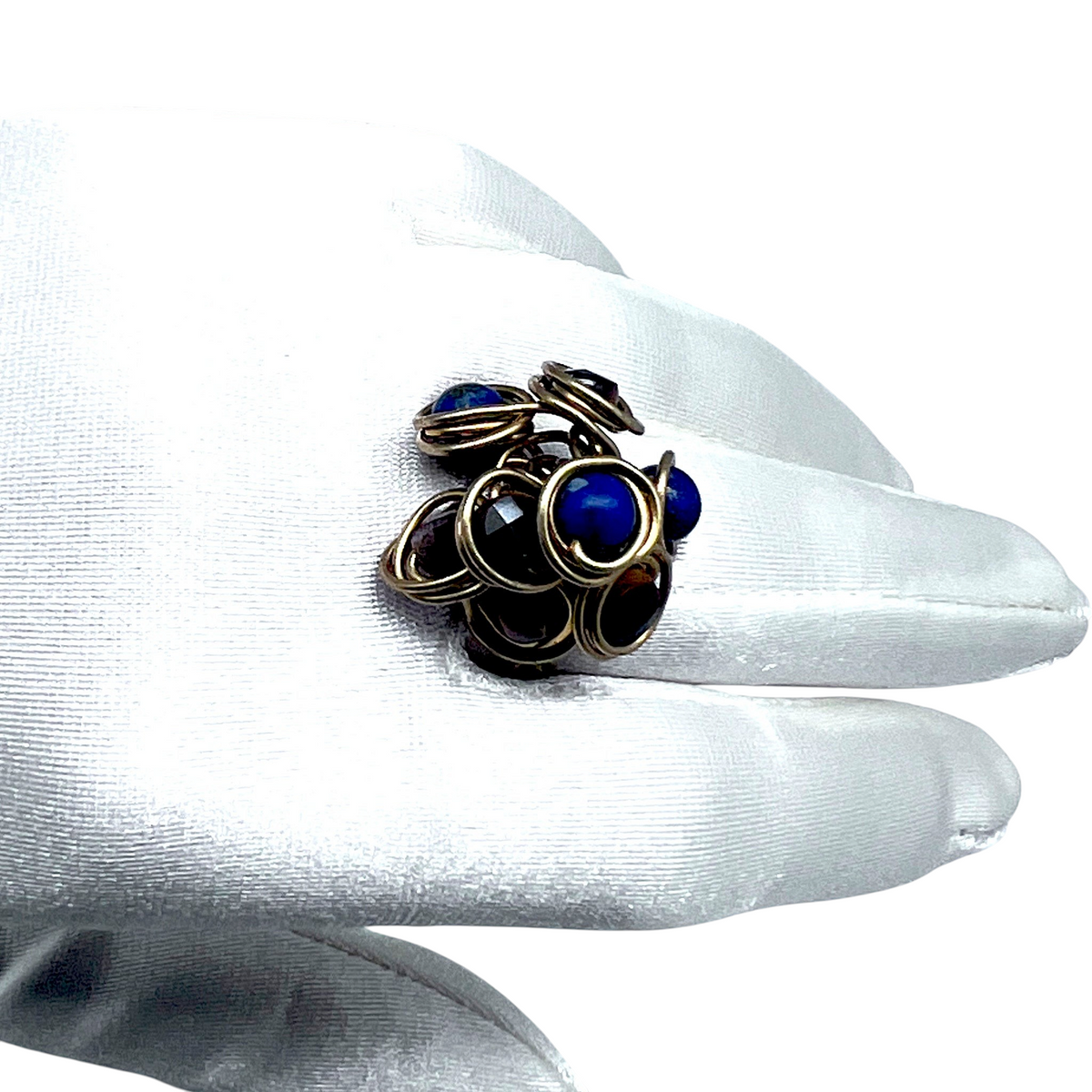 Ruby Feathers handcrafted cluster ring with Lapis Lazuli and Tiger's Eye stones wrapped in organic brass wire.