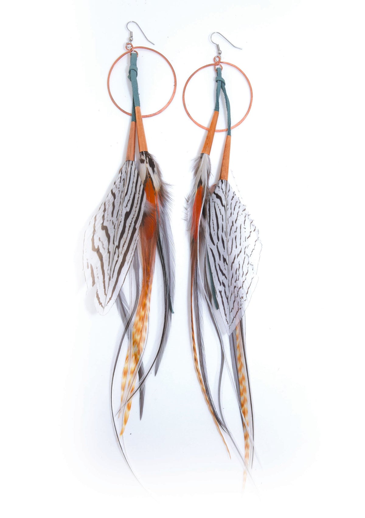 Ruby Feathers Luna hoop earrings featuring long striped feathers, leather tassels, and copper rings.