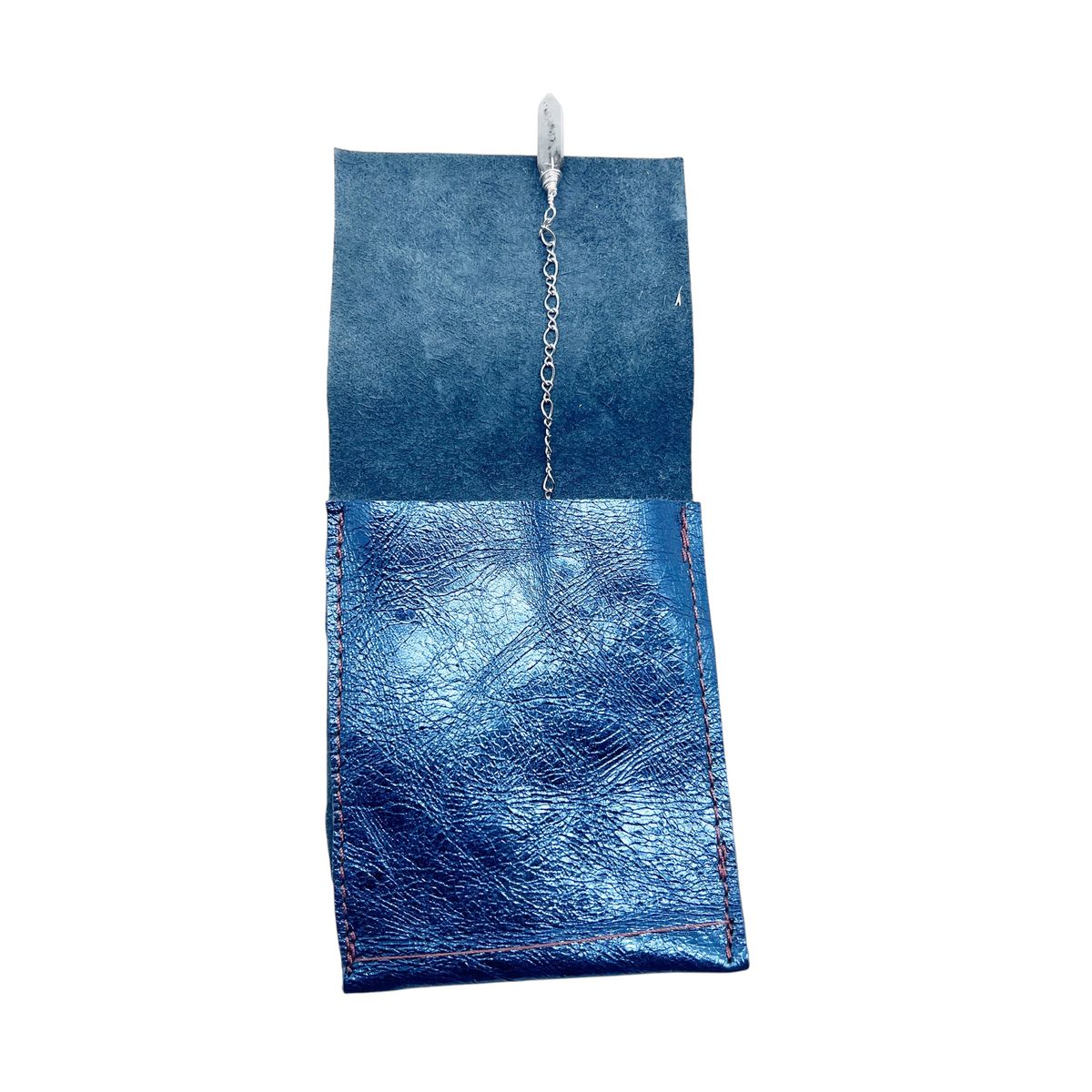 Ruby Feathers Mystic Shield pendulum with amethyst point and steel chain inside a metallic blue leather pouch