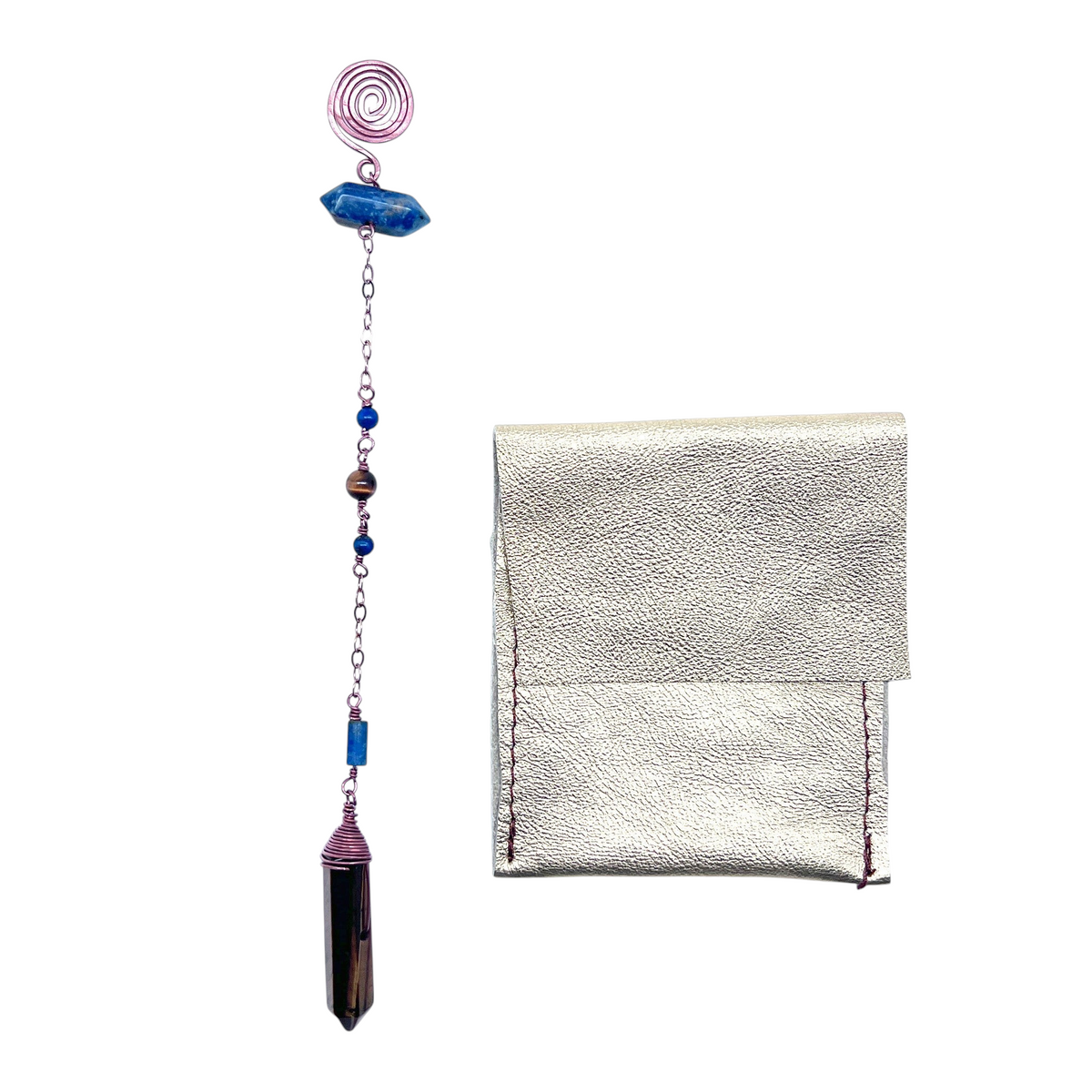 Ruby Feathers Sacred Truth pendulum with Tiger's Eye point, Lapis Lazuli beads, copper chain, and leather pouch.