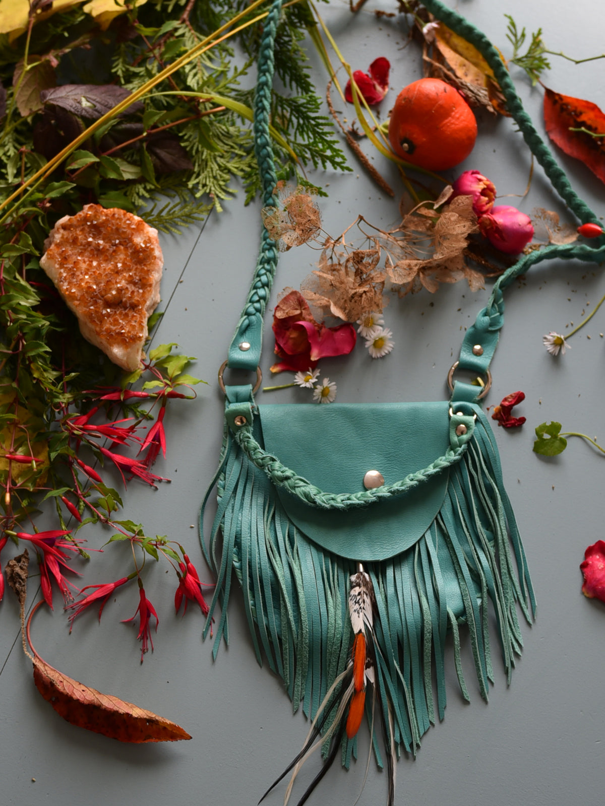 Ruby Feathers Achack leather and feather fringe bag.