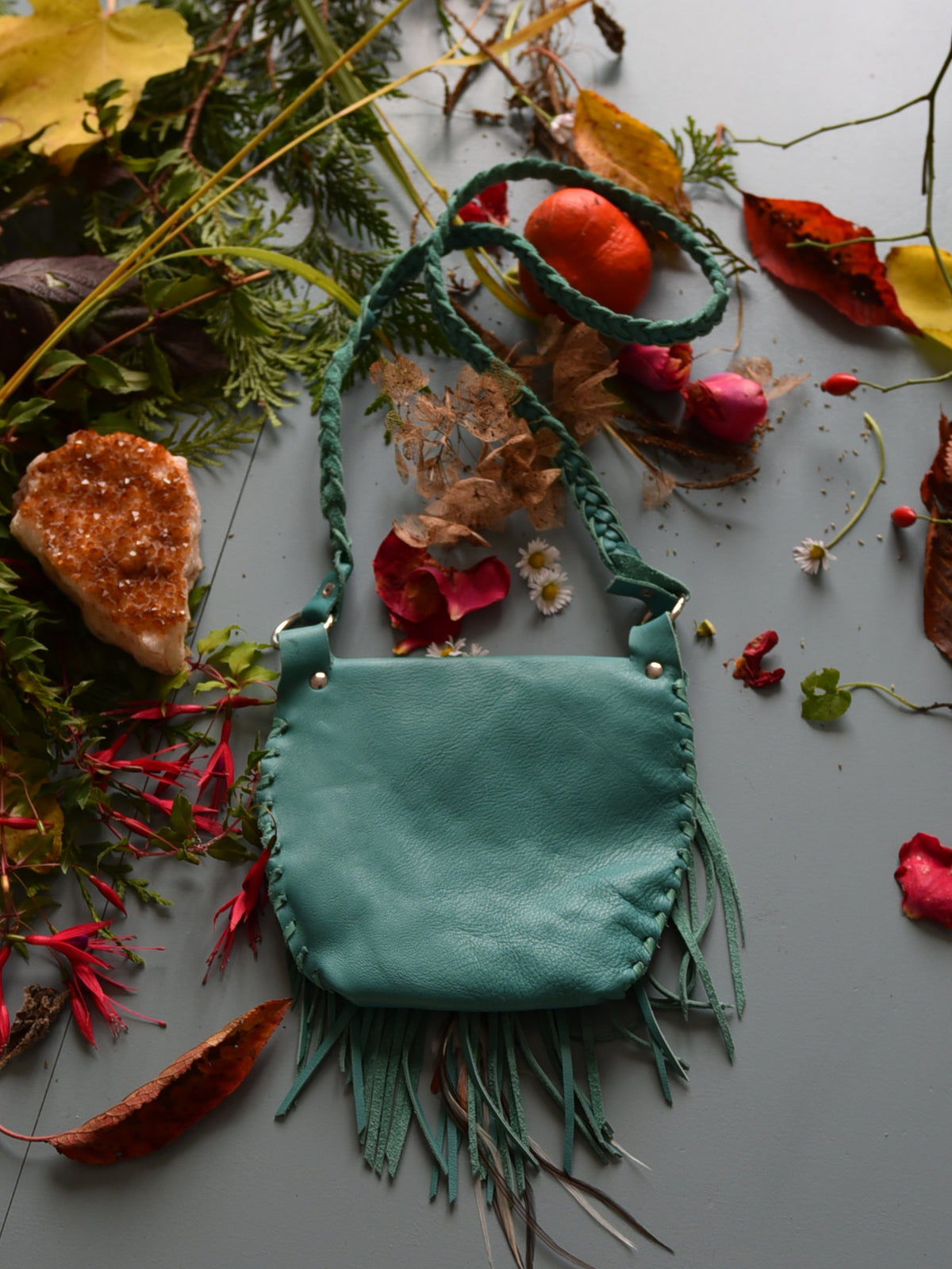 Ruby Feathers Achack leather and feather fringe bag.