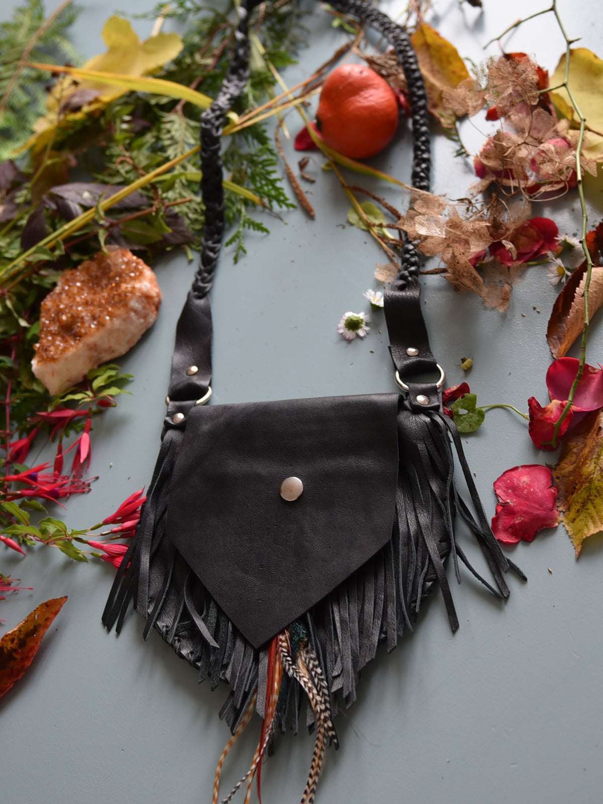 Ruby Feathers Achack leather and feather fringe bag.