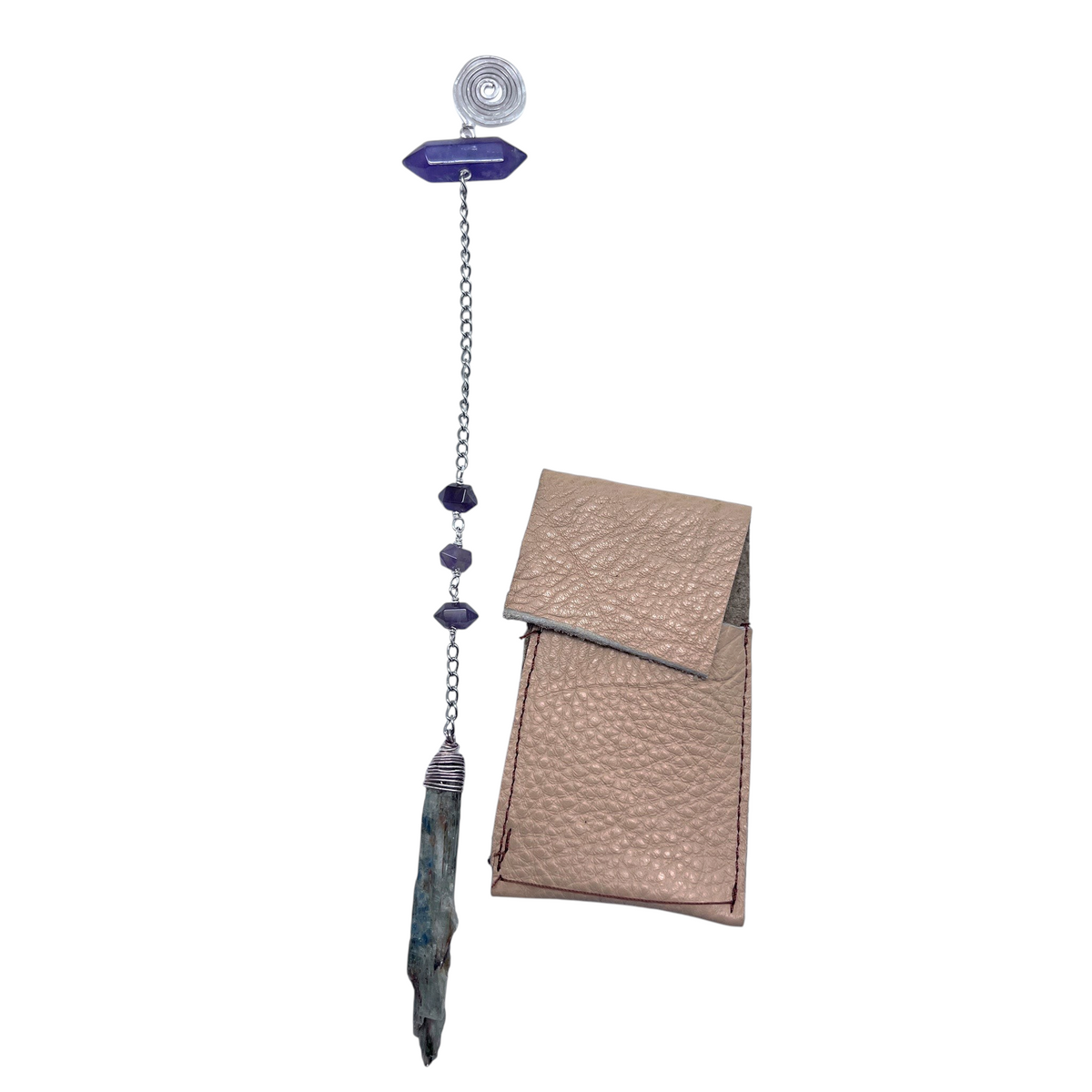 Ruby Feathers pendulum featuring blue kyanite and amethyst crystals on a steel chain with a leather storage pouch.