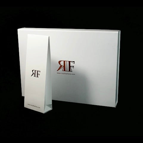 Ruby Feathers branded white gift box and matching paper bag for The Third Eye Oracle Pendulum packaging