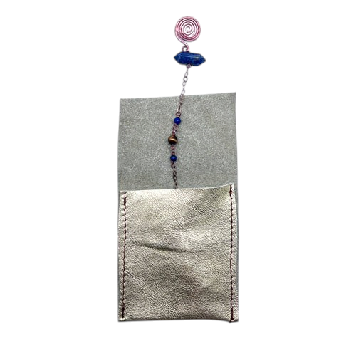 Ruby Feathers pendulum with blue kyanite and amethyst crystals on a steel chain, displayed with a leather pouch.