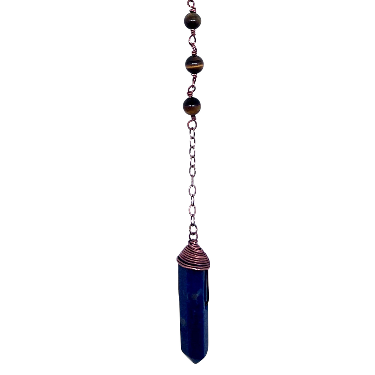 Ruby Feathers Sovereign Eagle pendulum with lapis lazuli crystal, tiger's eye beads, and a copper chain.