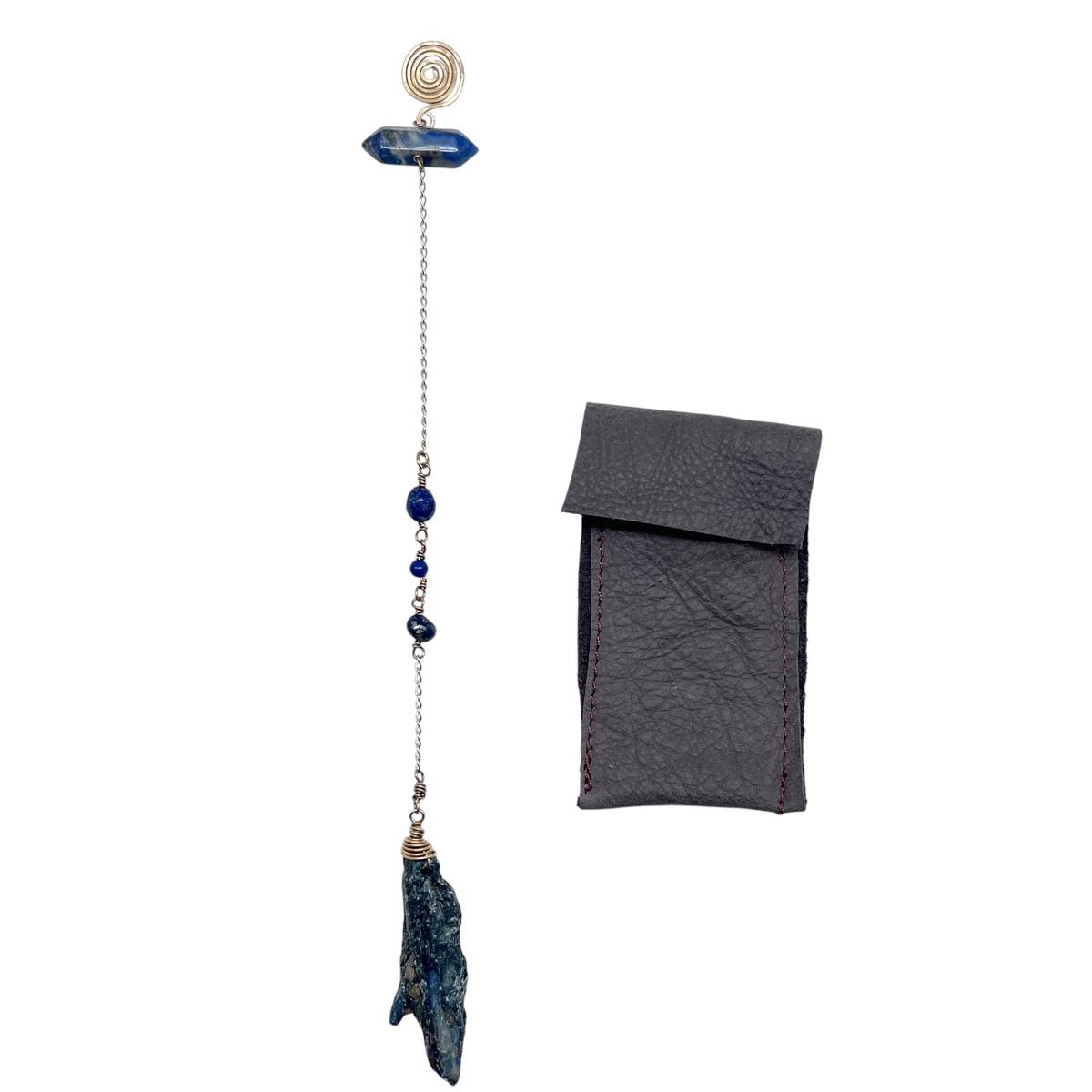 Ruby Feathers Third Eye Oracle pendulum with lapis lazuli, blue kyanite, and brass, shown with a leather pouch.