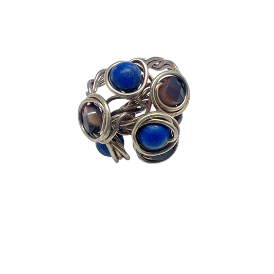 Ruby Feathers handcrafted statement ring with blue Lapis Lazuli and brown Tiger's Eye stones in wrapped brass wire.