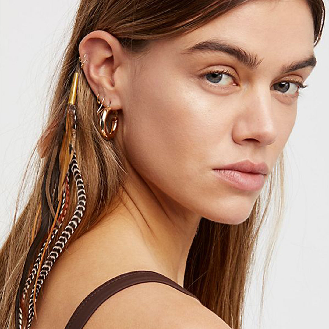 Ruby Feathers Sinnet hair extension clip featuring natural brown and striped feathers attached to a brass finding.