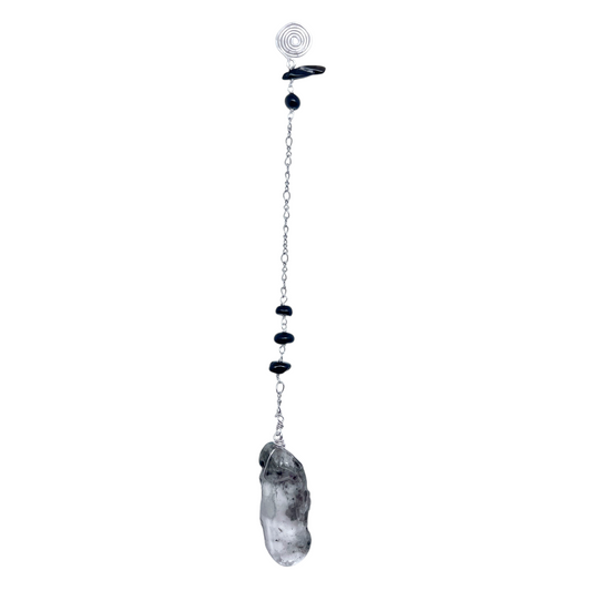 Ruby Feathers Aegis Shadow pendulum featuring a smoky quartz point, black tourmaline beads, and a silver-toned chain.