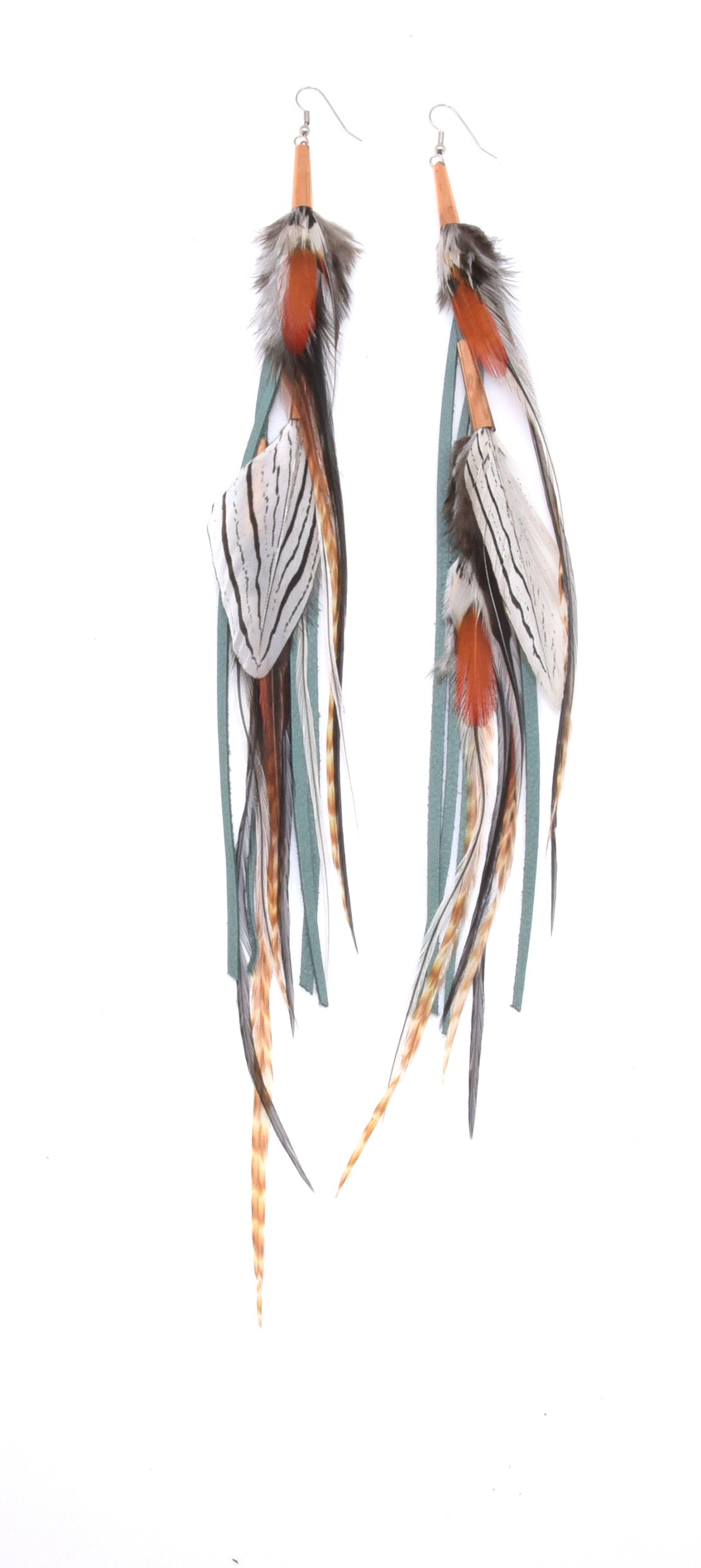 Ruby Feathers Utopia earrings featuring long, ethically sourced multi-colored feathers and suede fringe accents.