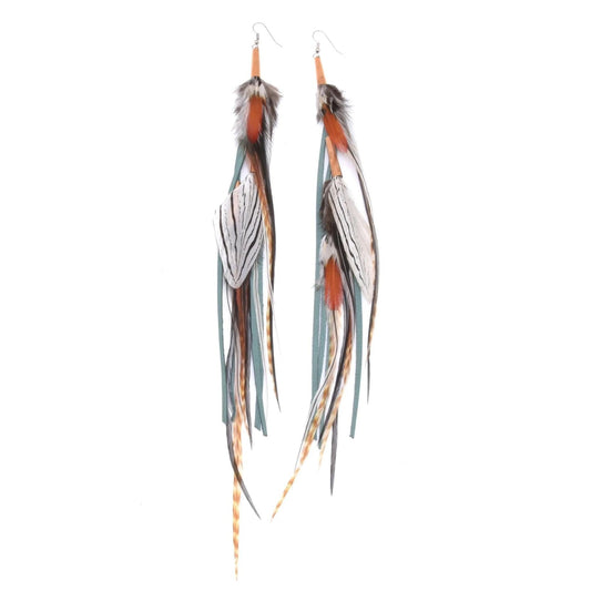 Ruby Feathers Utopia earrings featuring long, layered natural feathers in grey, white, and orange with leather accents.